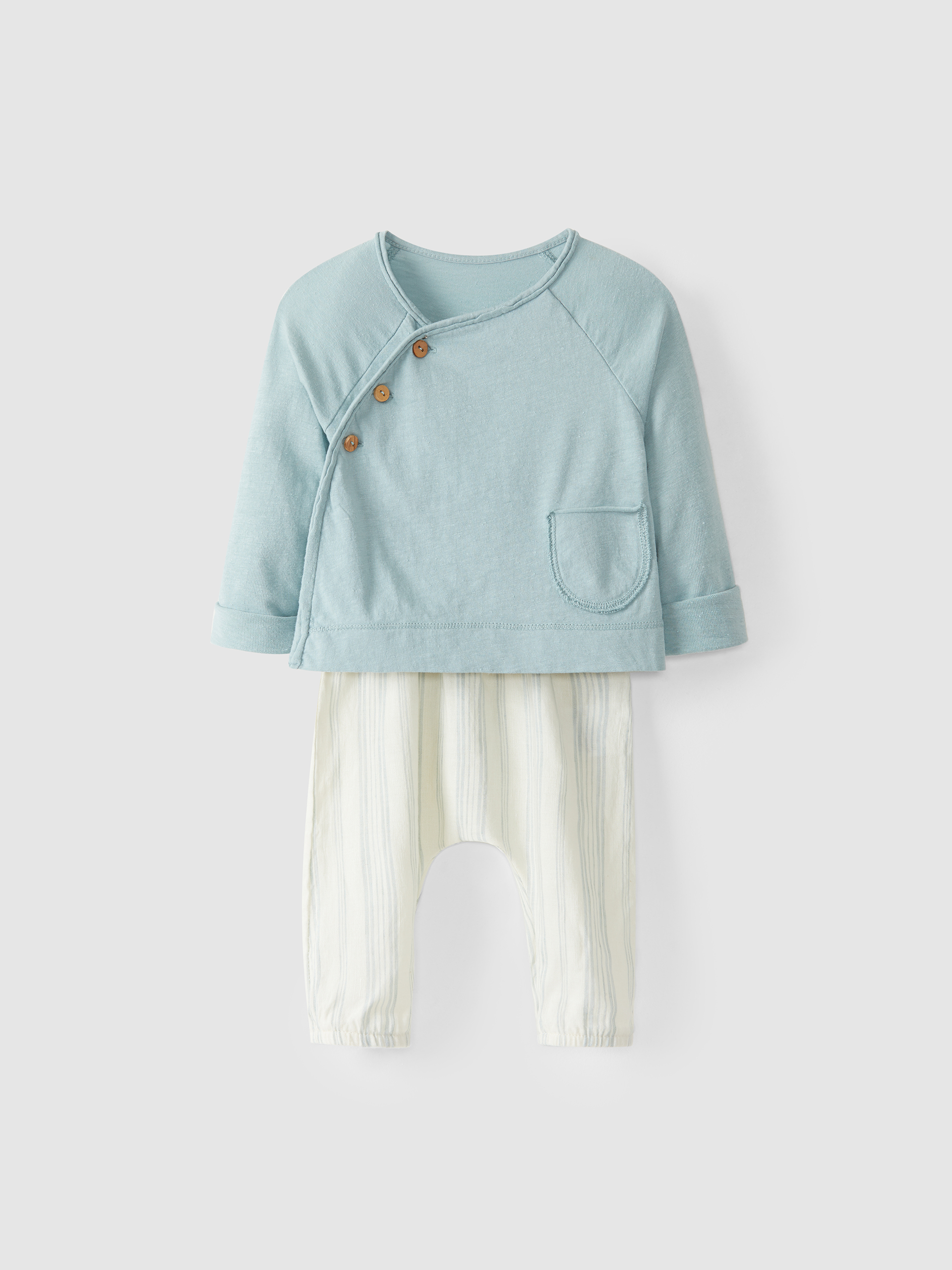 Conjunto de suéter cruzado y pantalón