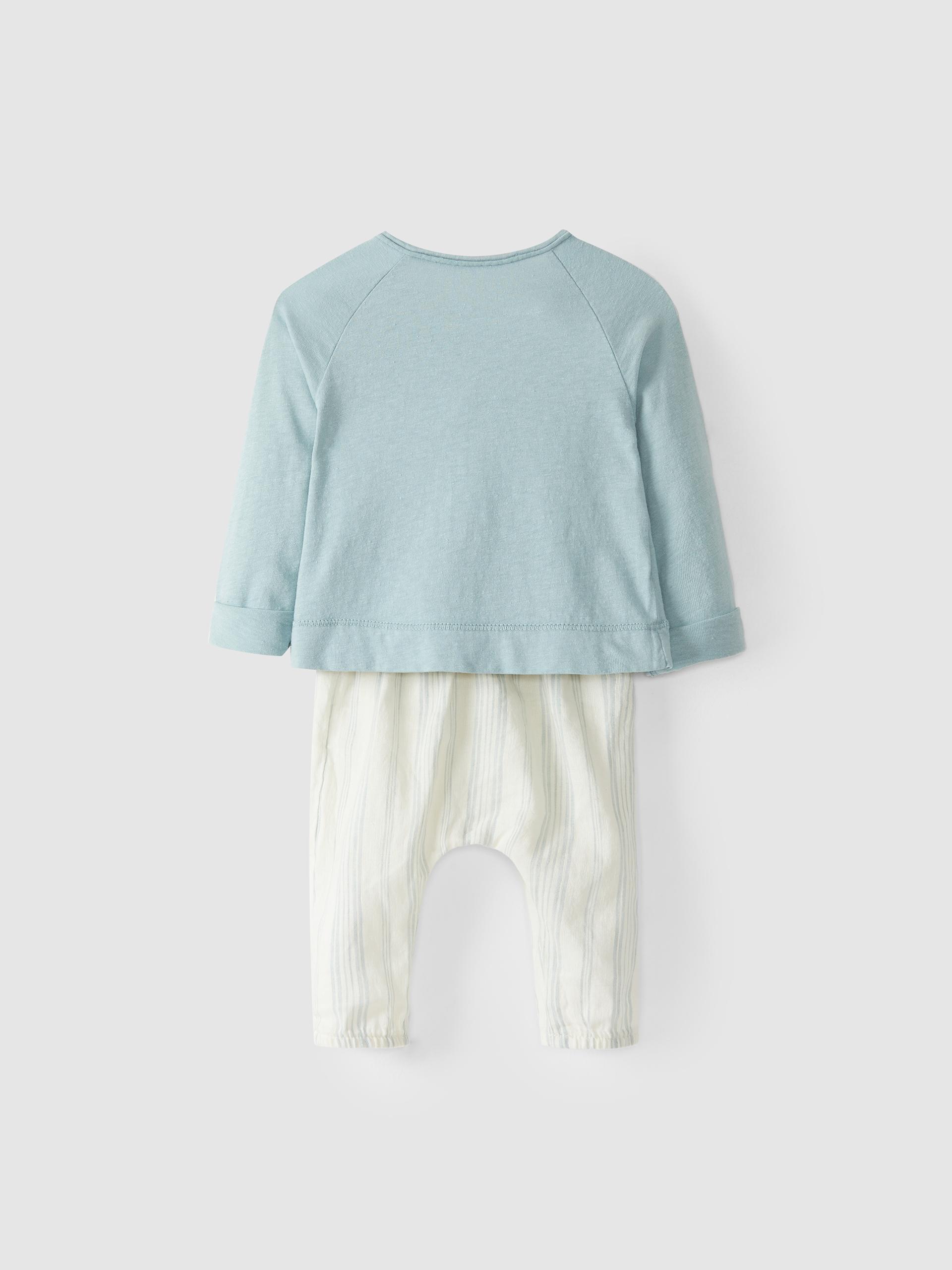 Conjunto de suéter cruzado y pantalón