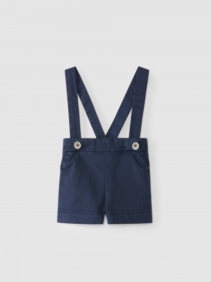 Pantalón corto de lona con tirantes Pantalón corto de lona con tirantes