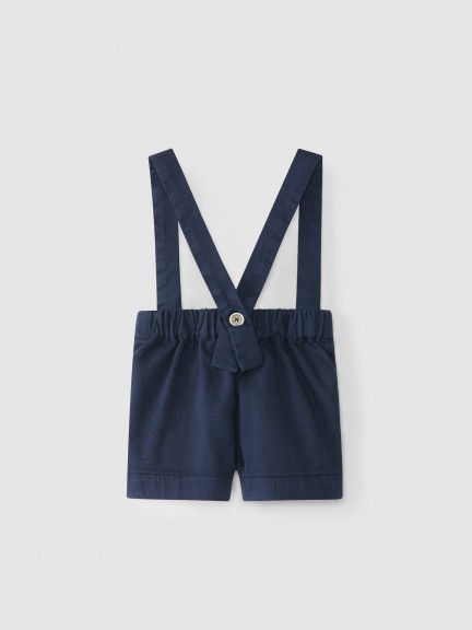 Pantalón corto de lona con tirantes Pantalón corto de lona con tirantes