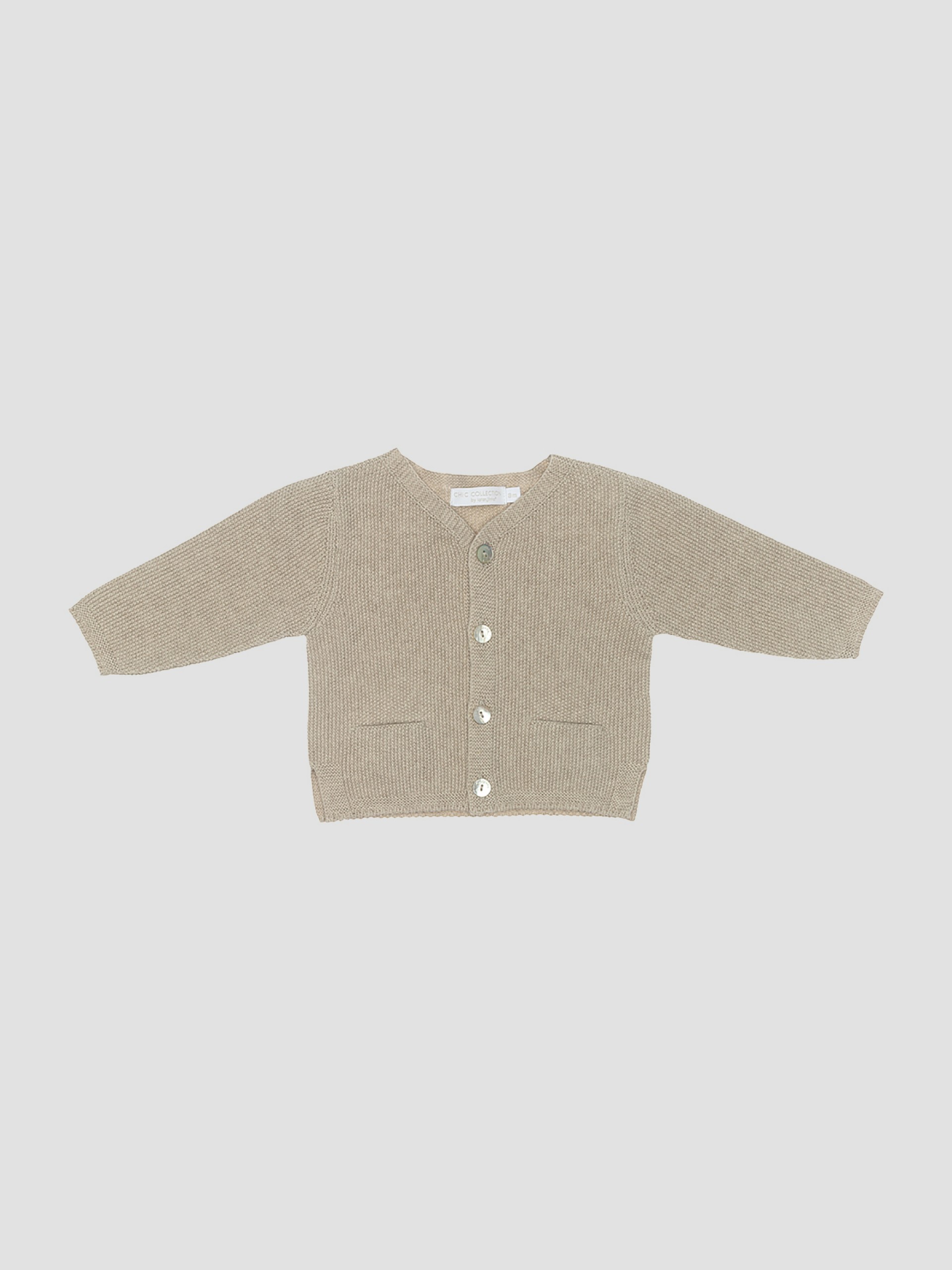 Gilet tricoté avec poches