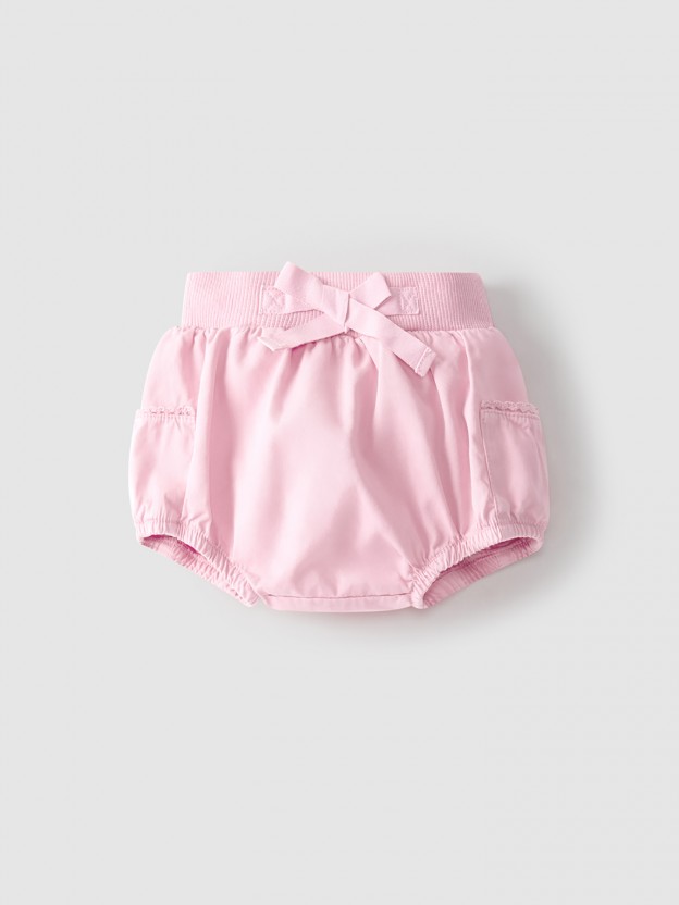 Tapa-fraldas com bolsos dos lados