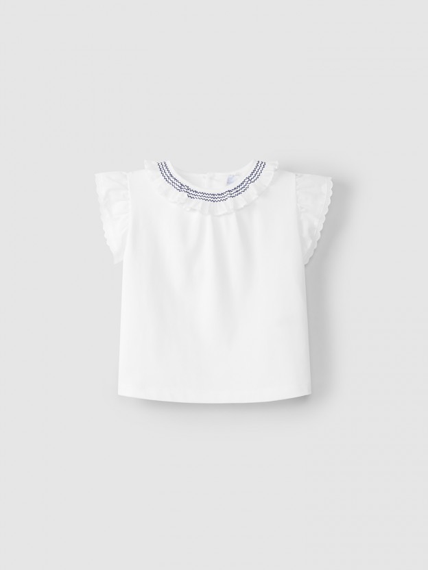 Blouse col � volant et broderie de smocks