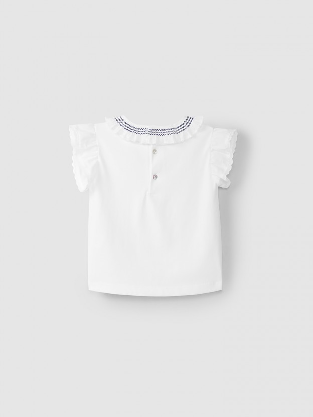 Blouse col � volant et broderie de smocks