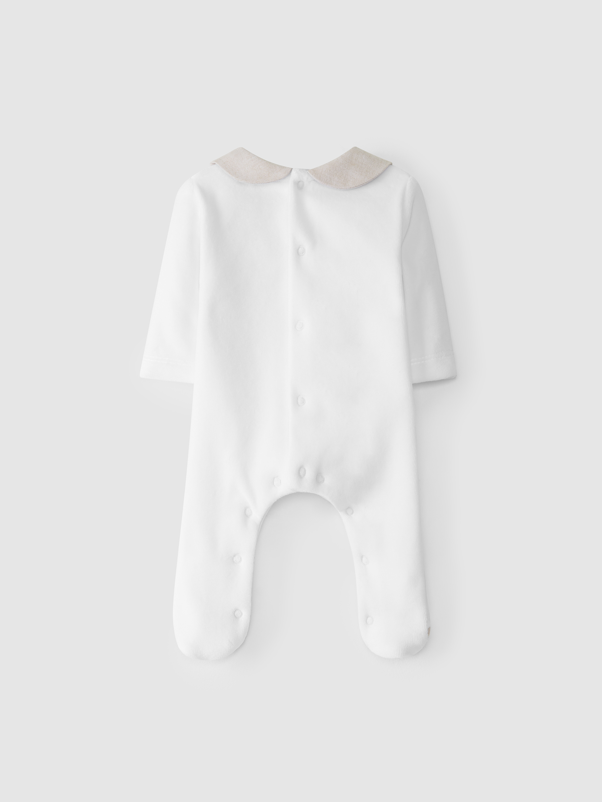Velvet babygrow with embroidered pocket