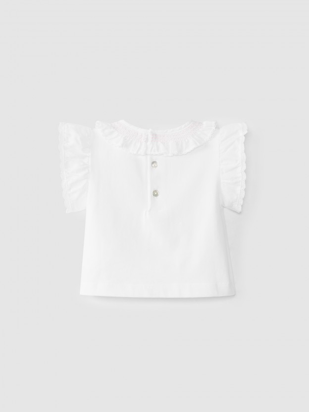 Blouse col � volant et broderie de smocks