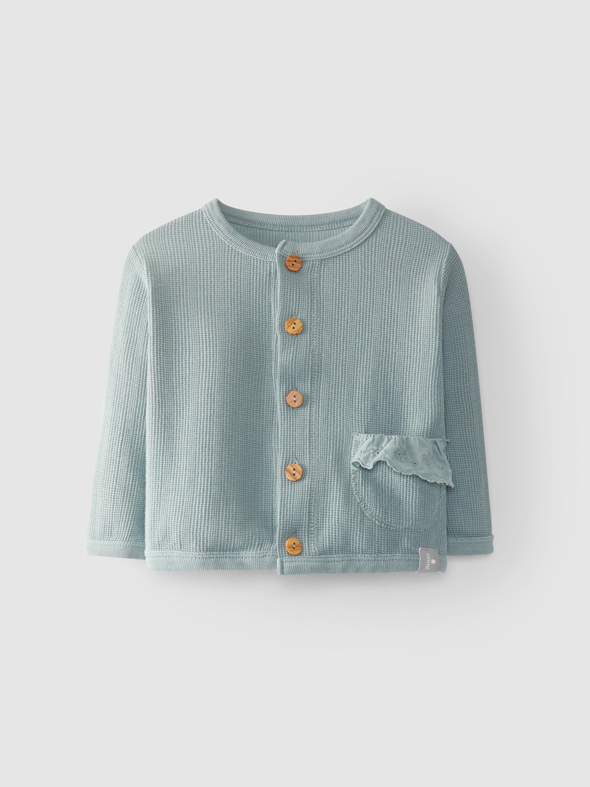 Jacket pocket with textured cotton ruffle