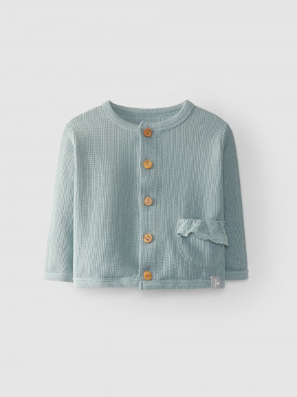 Gilet poche avec volant coton texturé Gilet poche avec volant coton texturé