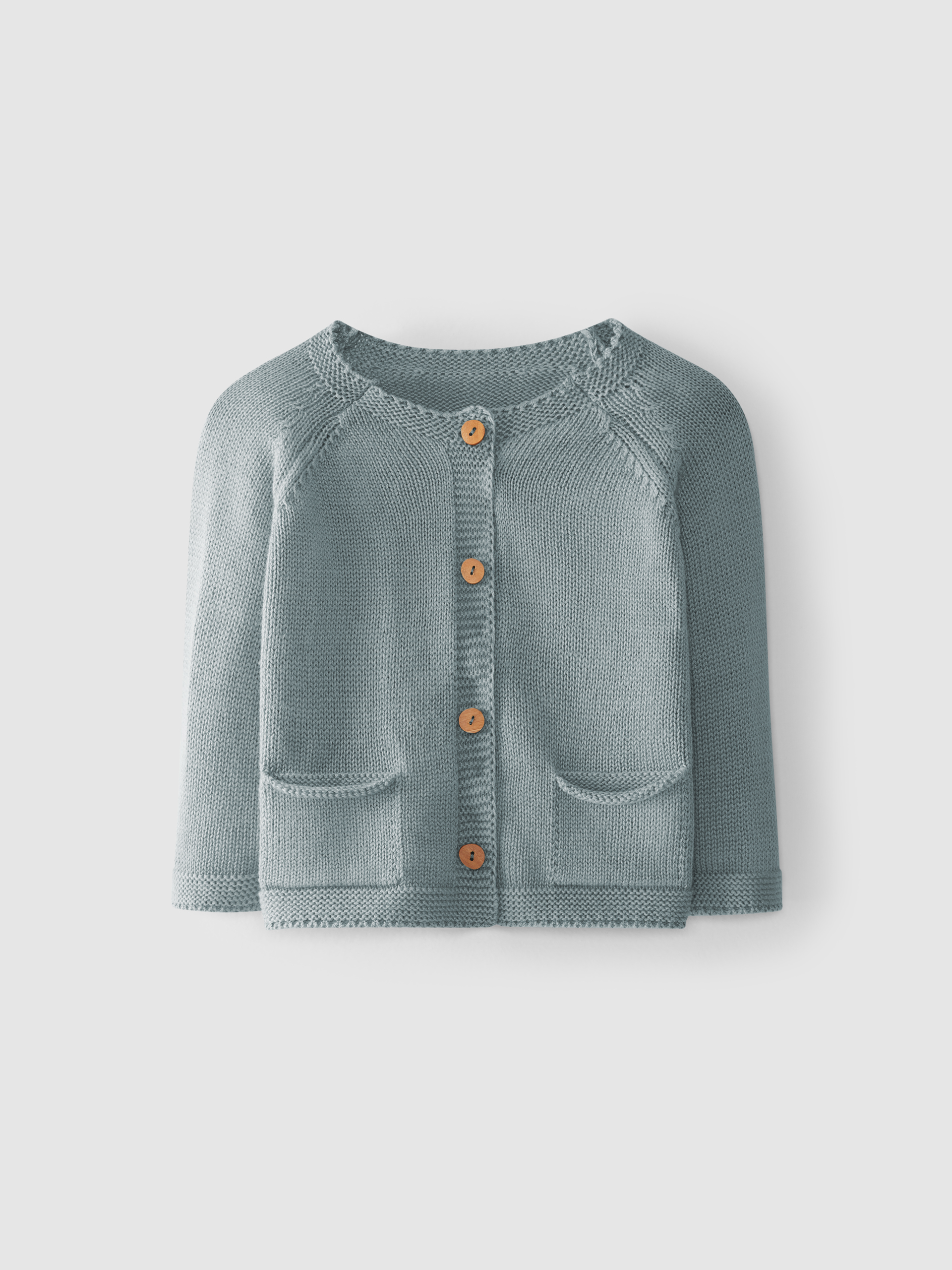 Gilet tricoté avec poches