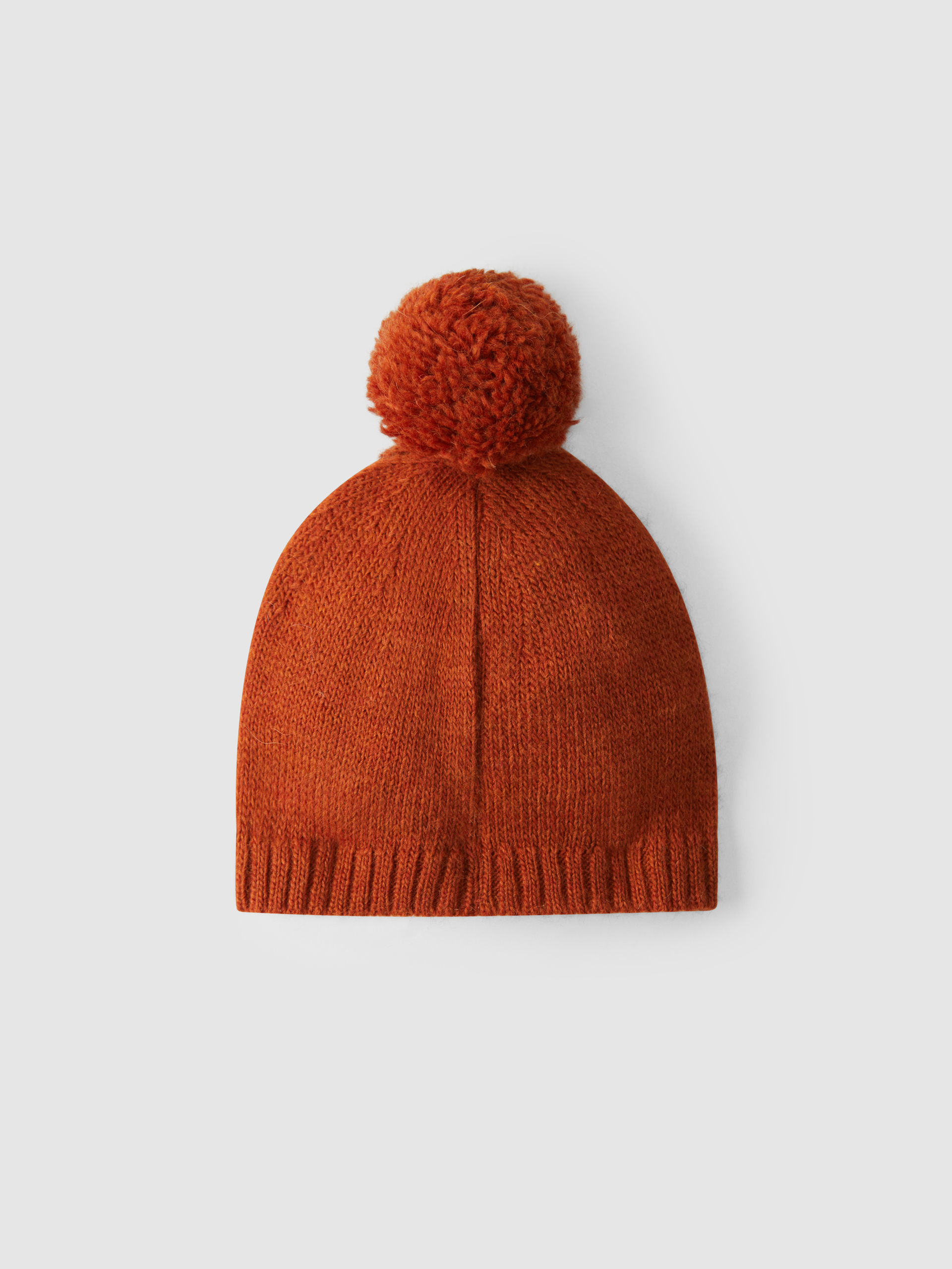Knitted hat with pom-pom