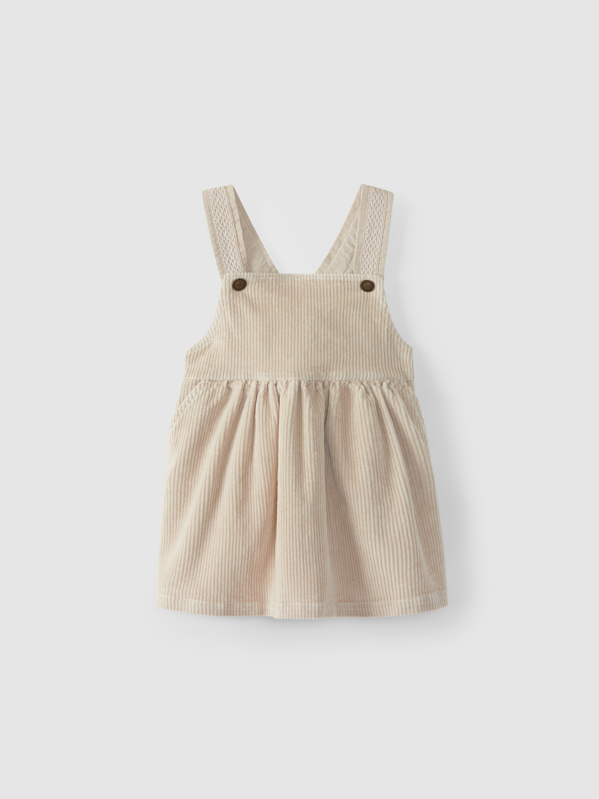 High-waisted, under-bust skirt with suspenders, with pockets