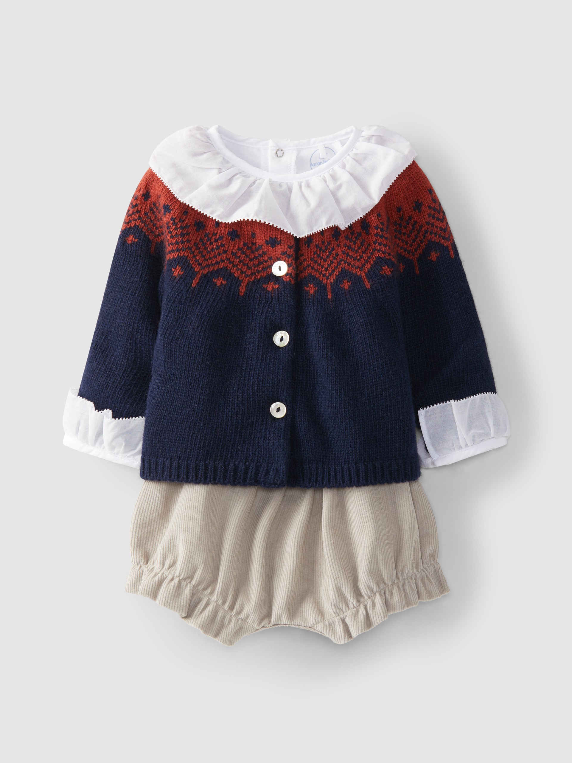 Conjunto abrigo cuello de volante y shorts jacquard