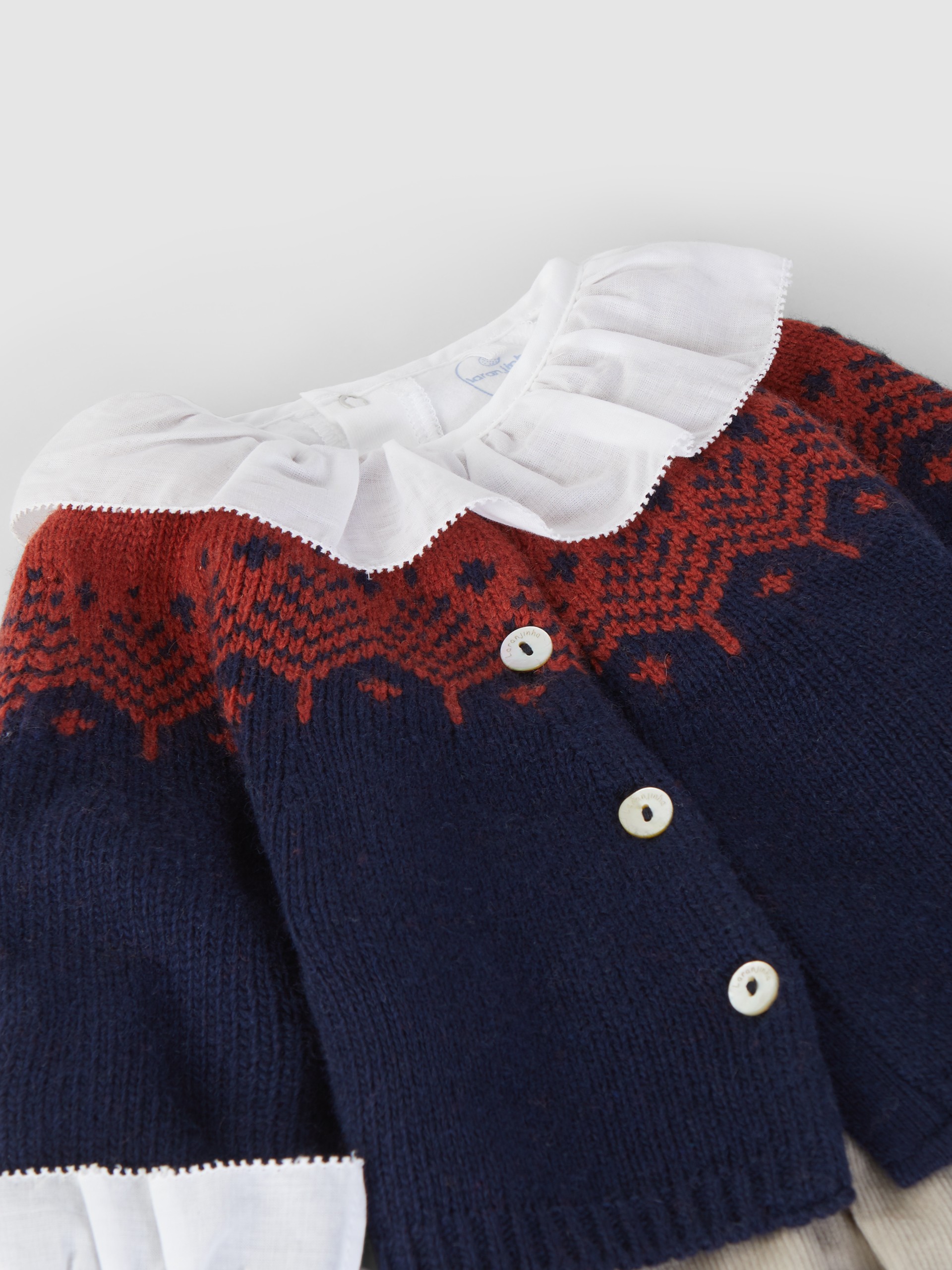 Conjunto abrigo cuello de volante y shorts jacquard