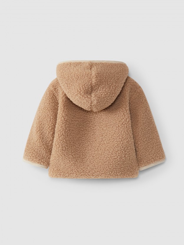 Gilet en fourrure à capuche Gilet en fourrure à capuche