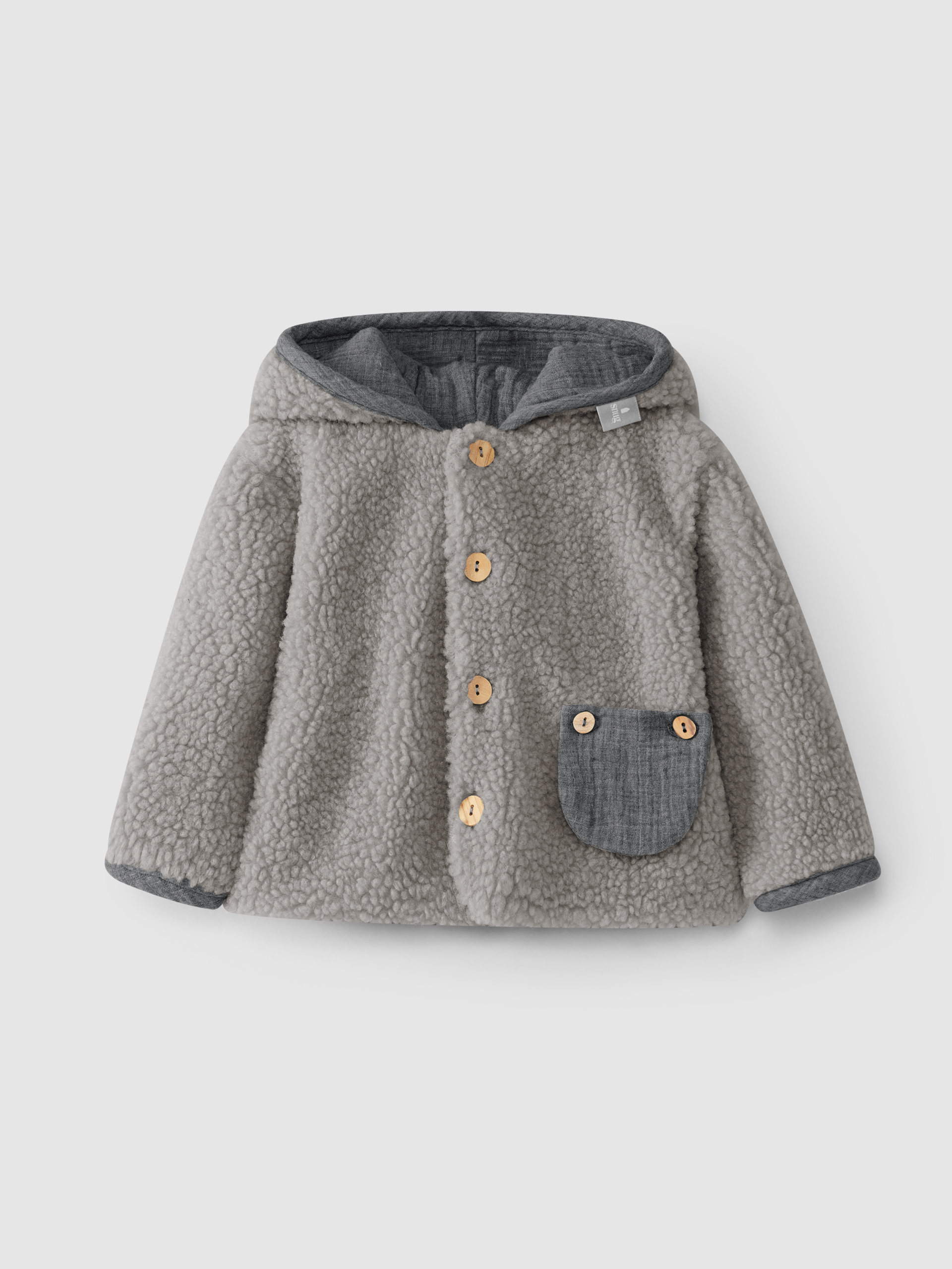 Gilet en fourrure à capuche