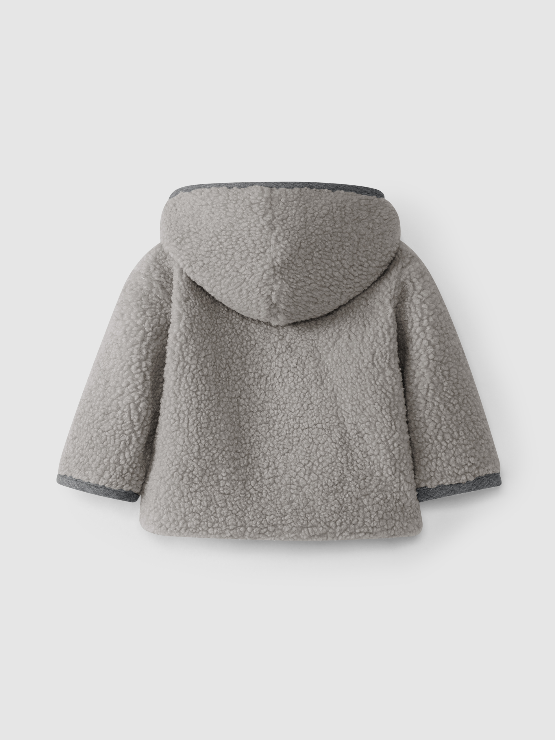 Gilet en fourrure à capuche