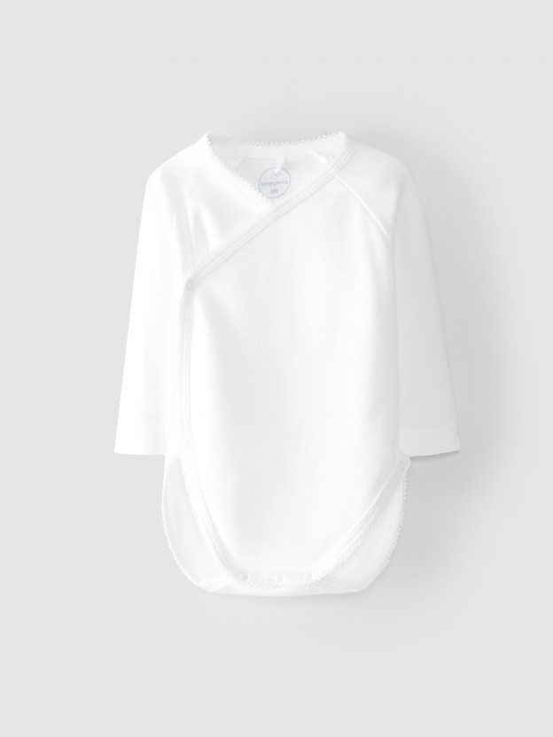 Crossover bodysuit with silhouette detail