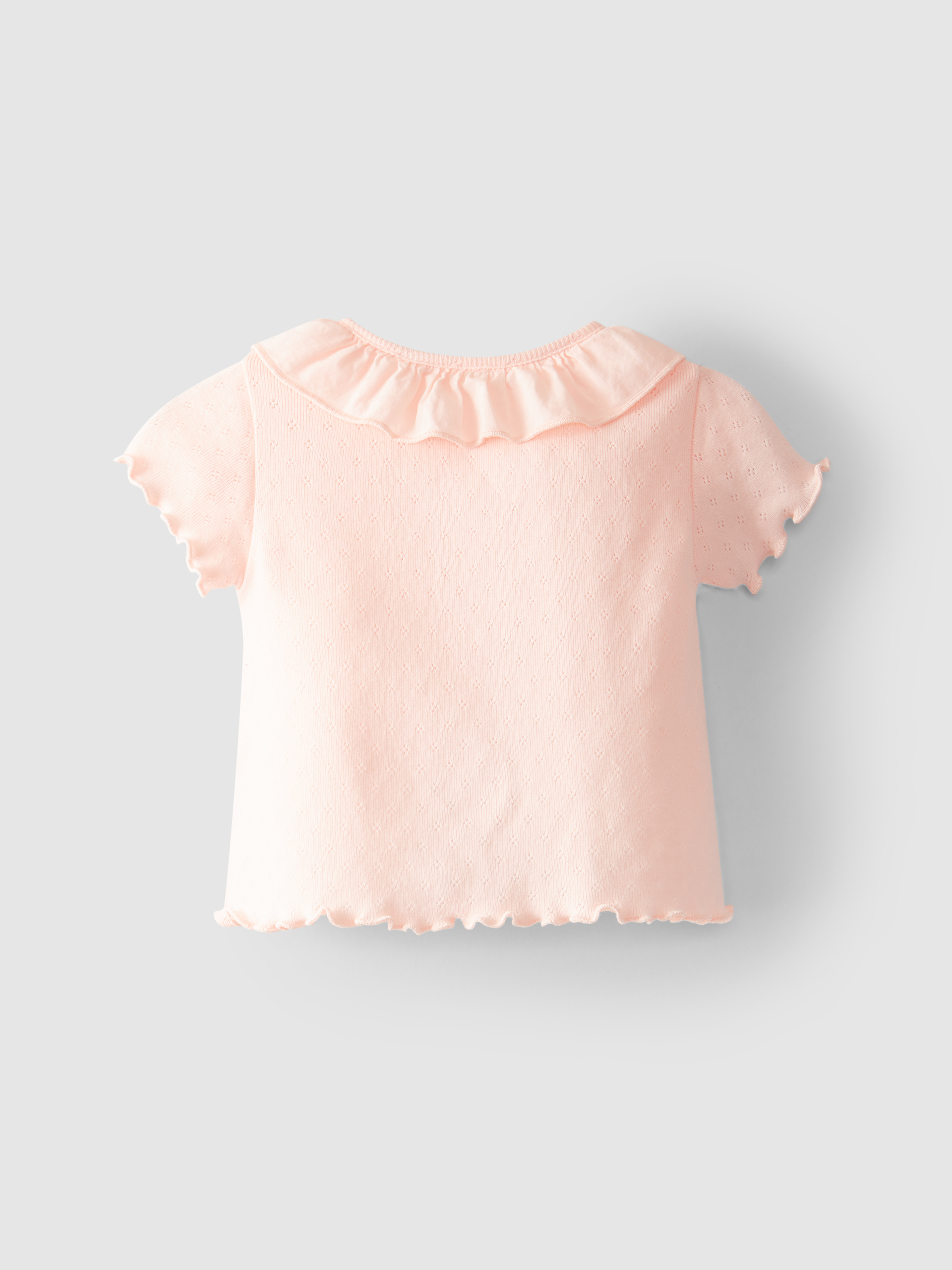 Blusa ajour con cuello de volante