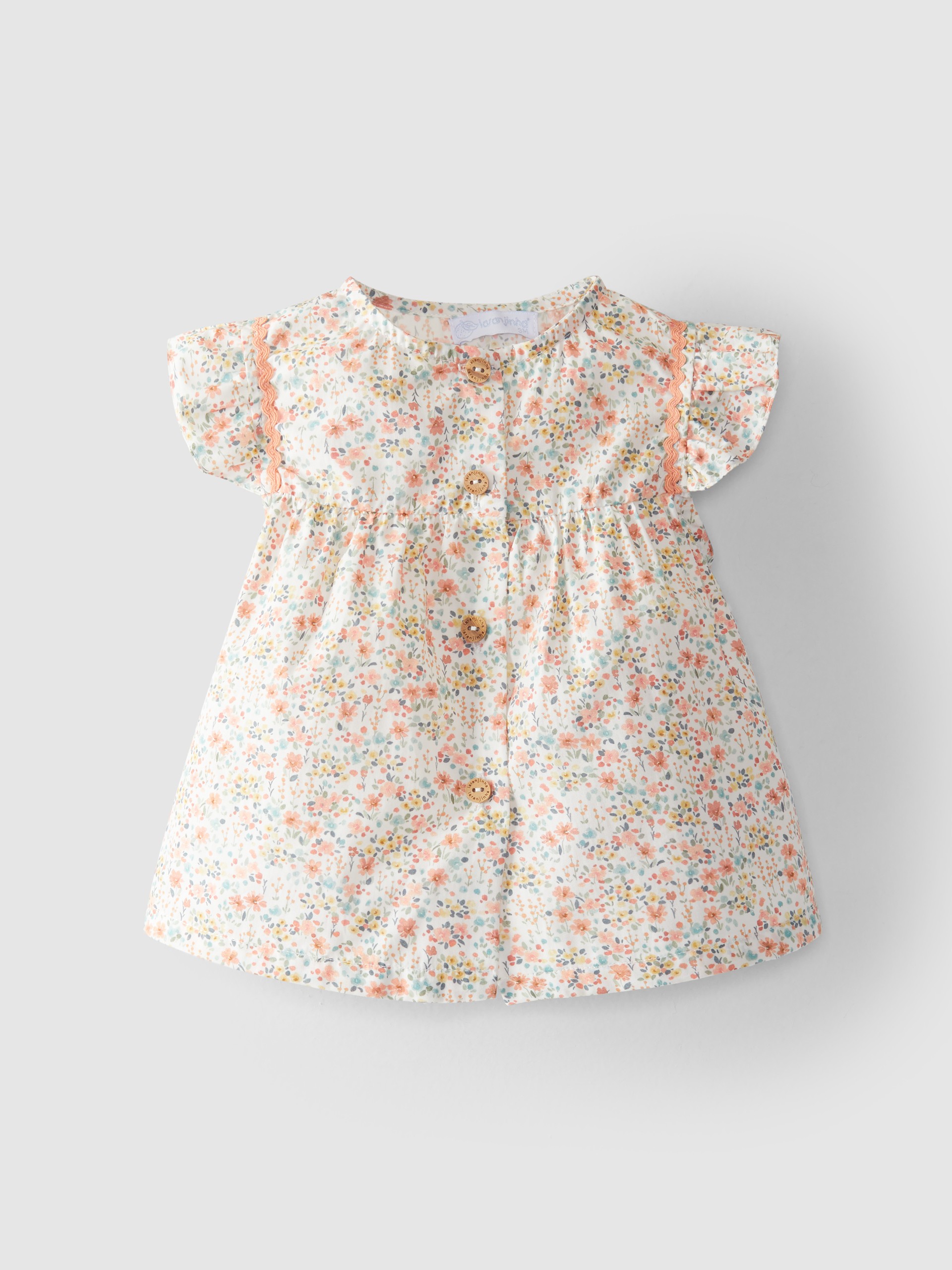 Blusa flores com espiguilha