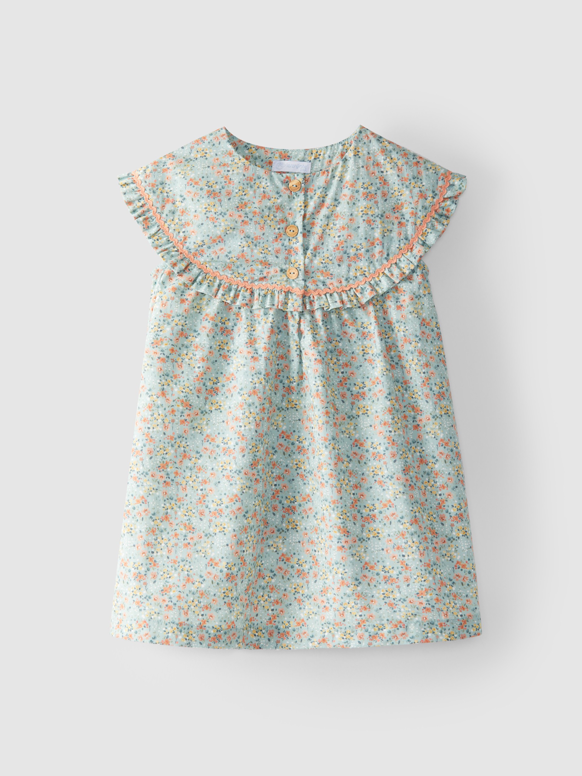 Dress floral with rickrack on the chest