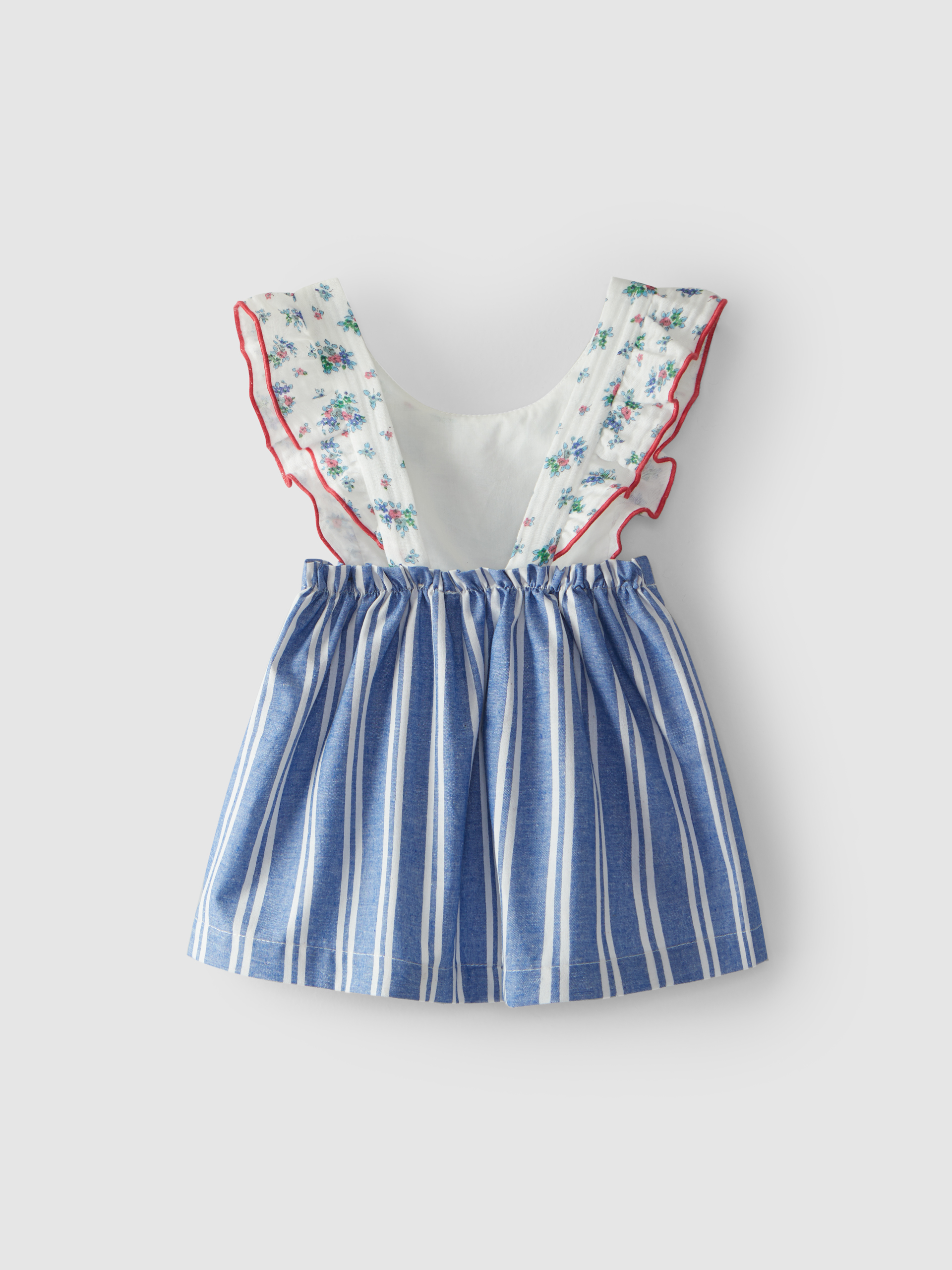 Falda con peto flores y rayas