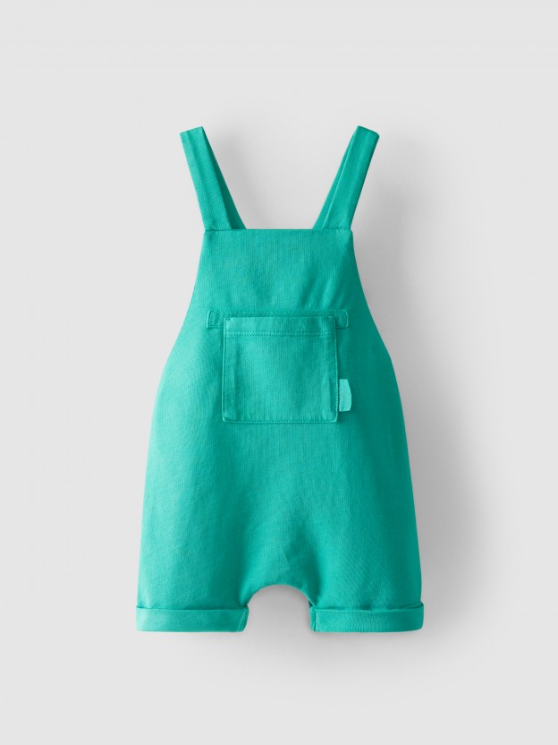 Short-salopette en coton avec poche Short-salopette en coton avec poche