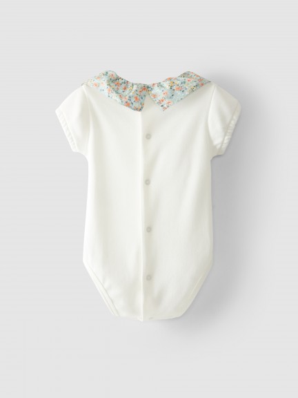 Body cuello de volante con flores Body cuello de volante con flores