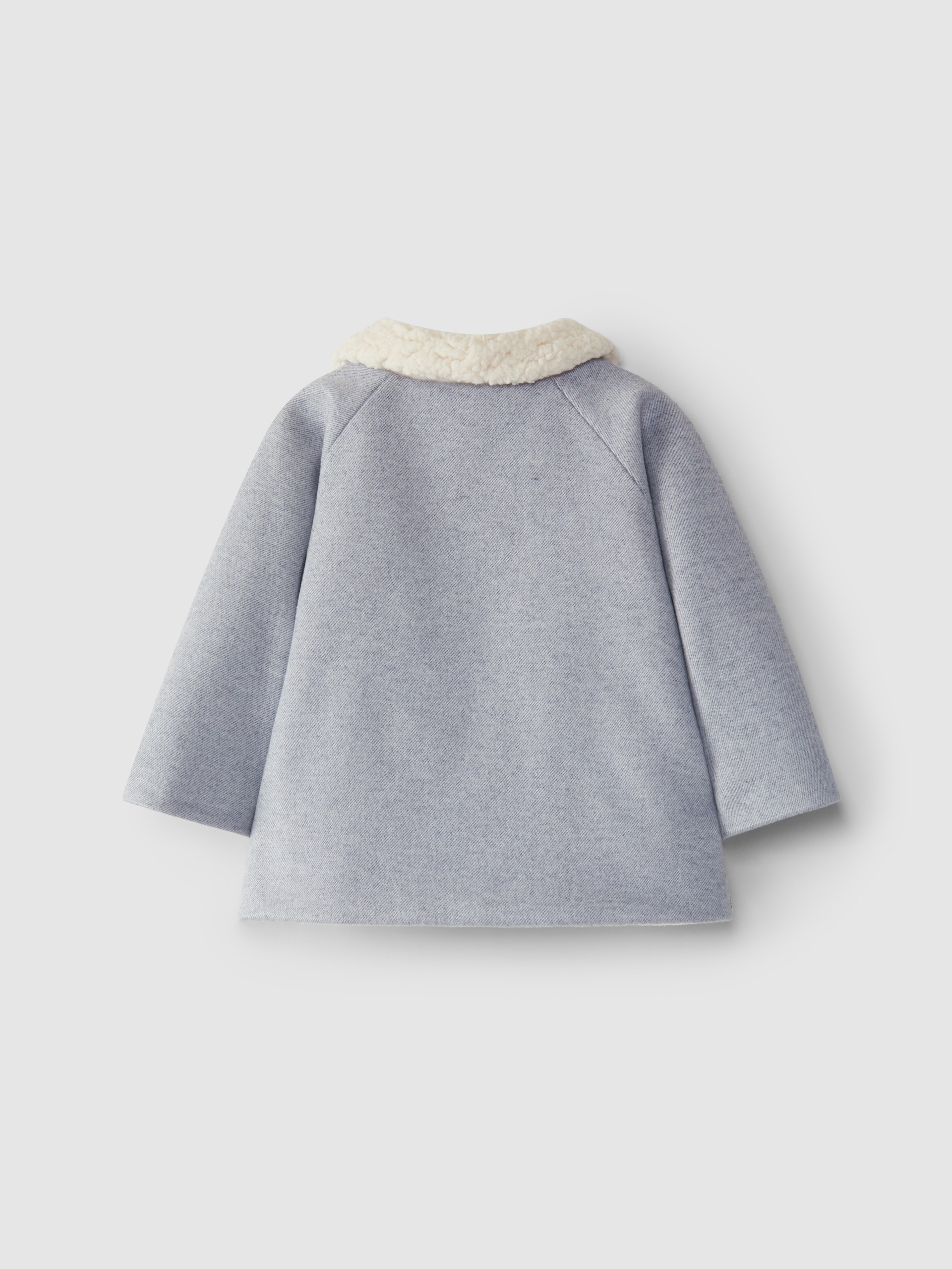 Coat with fur collar