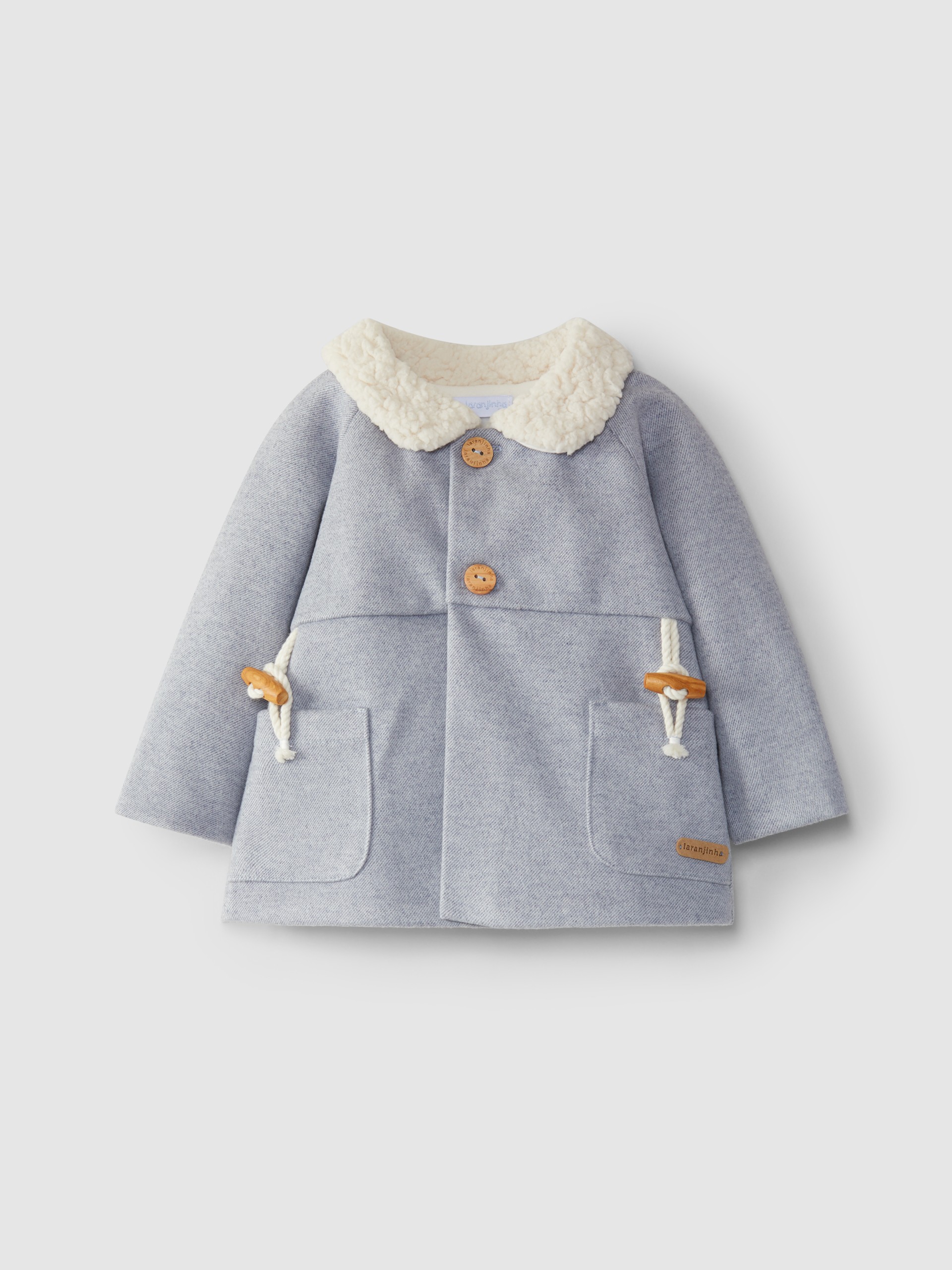 Coat with fur collar