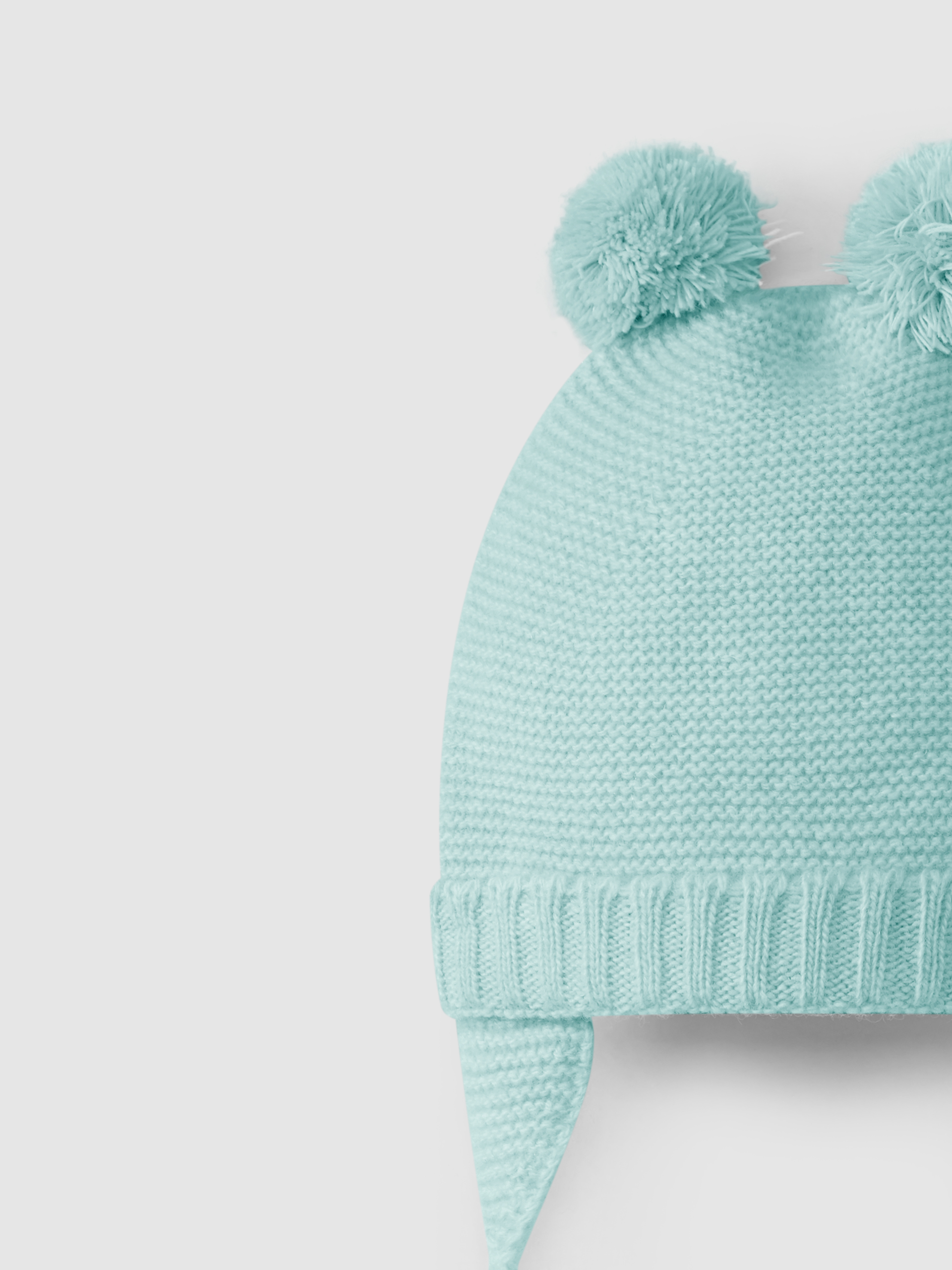 Aviator beanie with pom-poms
