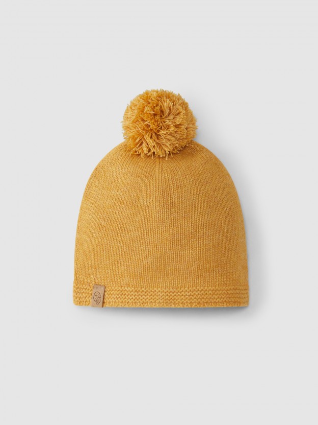 Knitted pom pom beanie