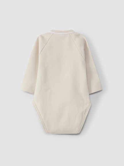 Crossover bodysuit with decorative detail Crossover bodysuit with decorative detail