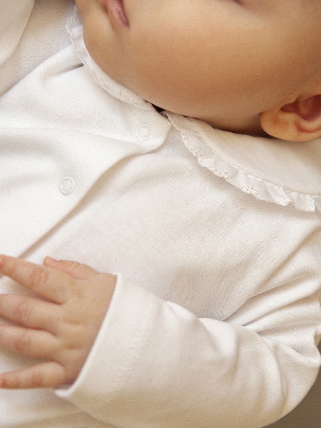 Babygrow with lace collar