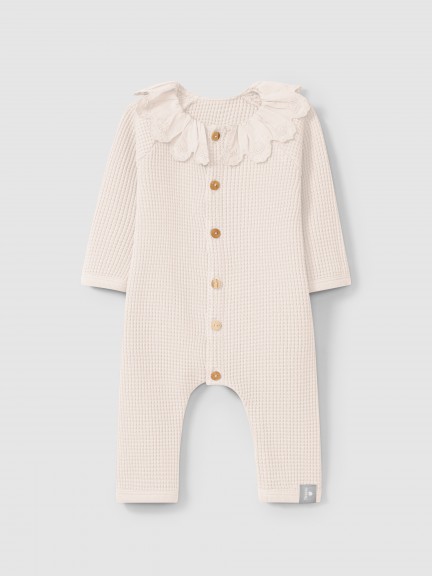 Waffle weave romper with ruffled collar Waffle weave romper with ruffled collar