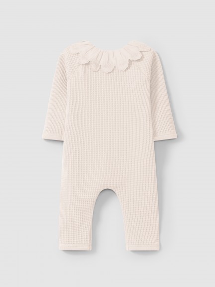 Waffle weave romper with ruffled collar Waffle weave romper with ruffled collar