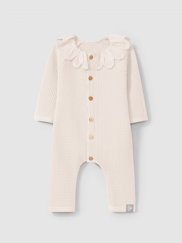 Waffle weave romper with ruffled collar Waffle weave romper with ruffled collar