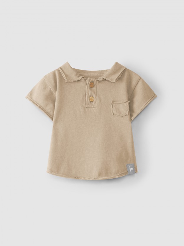 Polo uni avec poche Polo uni avec poche
