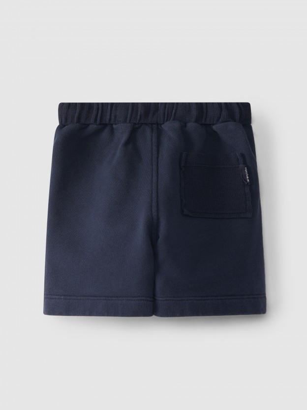 Plush shorts with waffle jersey pockets