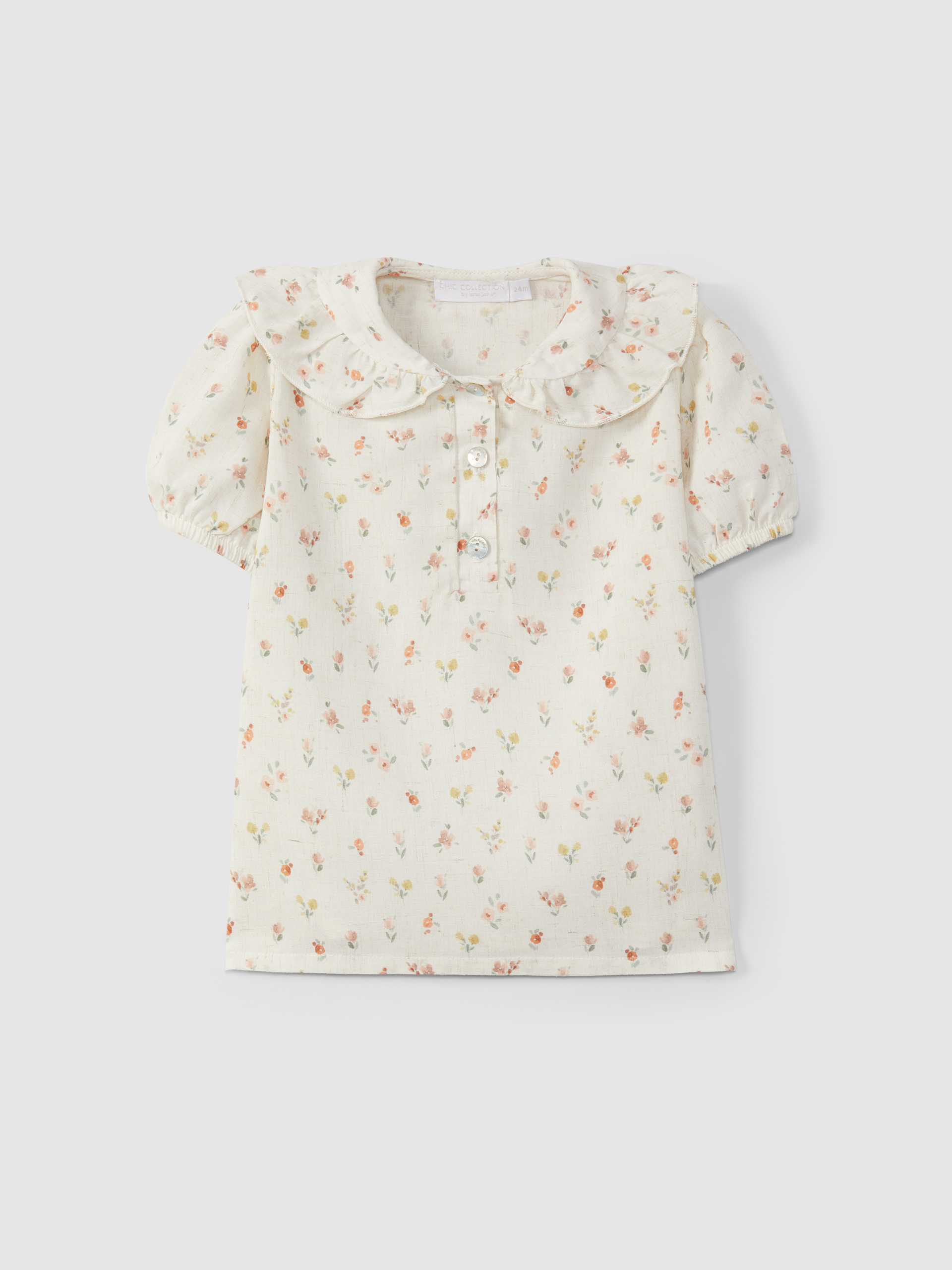 Blouse fleurs à col peter pan à volant