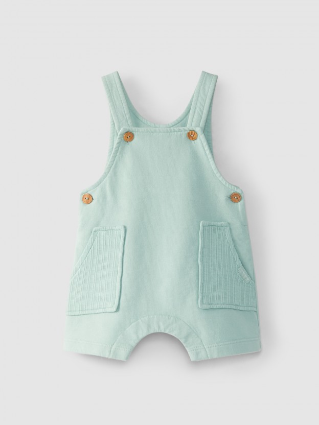 Short-salopette en peluche avec poches en maille jacquard