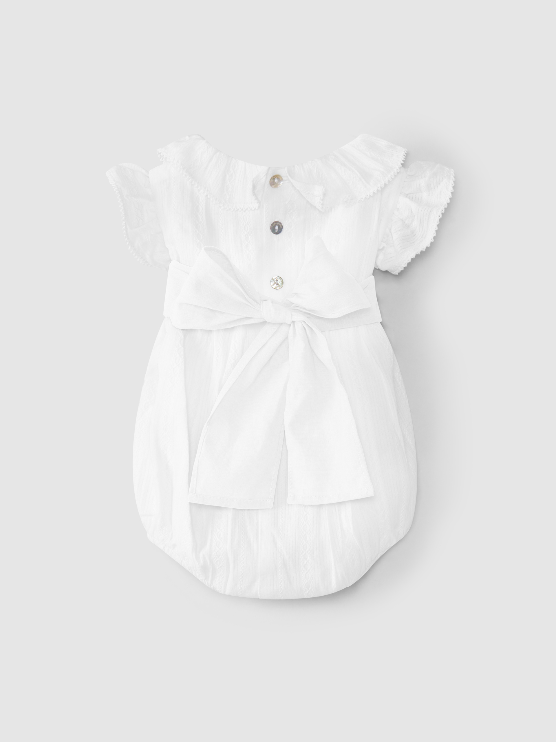 Shortie in embroidered fabric with sash
