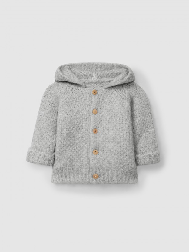 Gilet tricoté à capuche Gilet tricoté à capuche