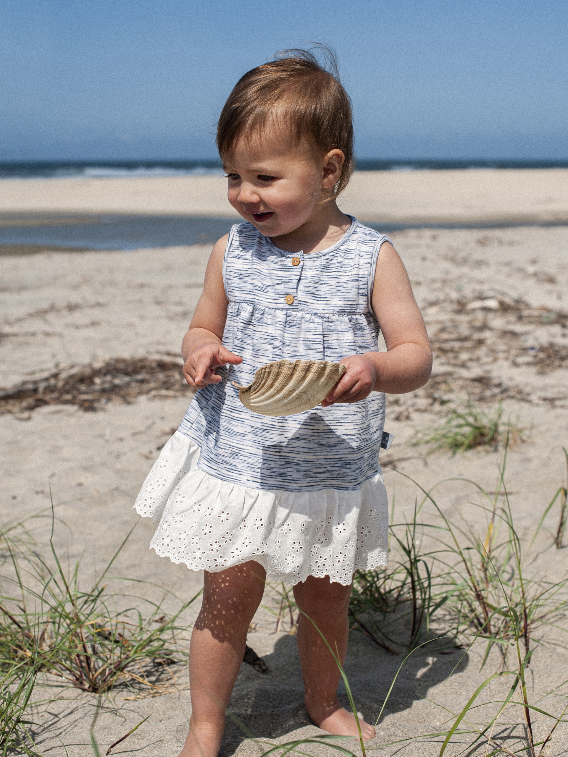 Dress in jersey with English embroidery ruffle