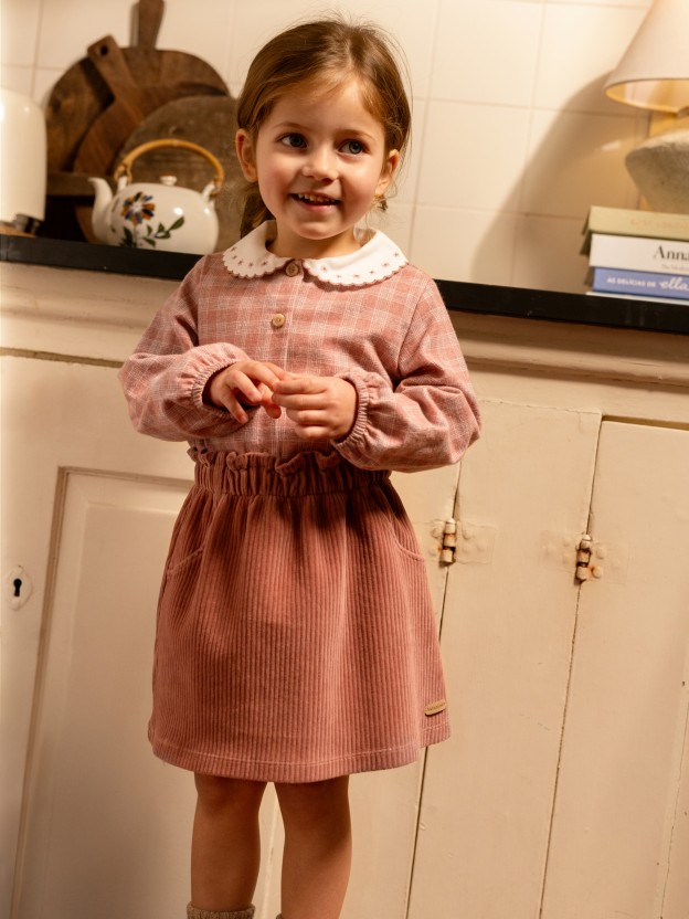 Pull-up skirt with decorative pockets Pull-up skirt with decorative pockets