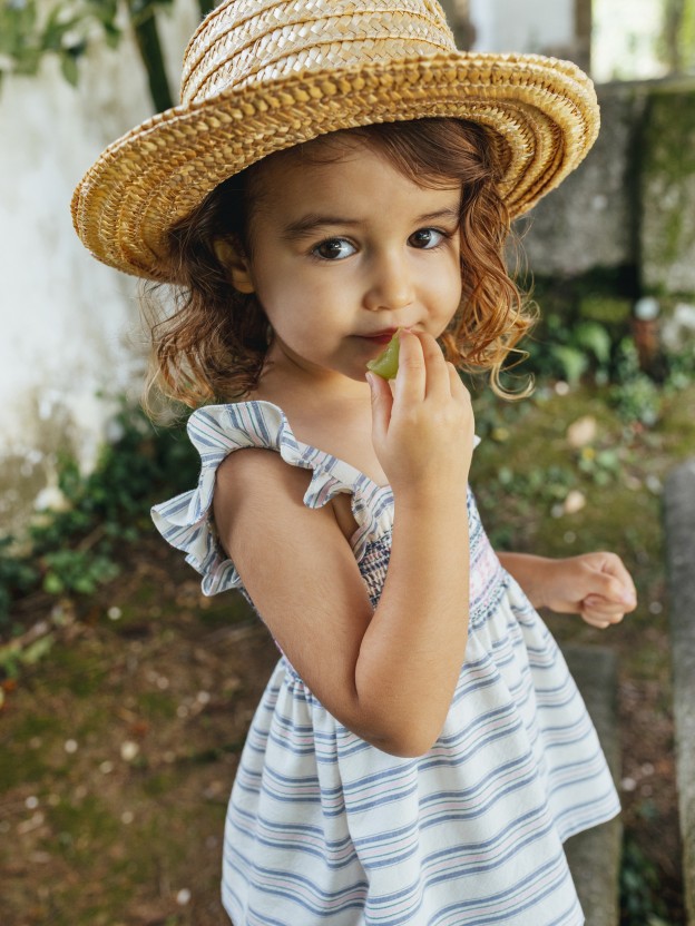 Blusa a rayas con smocks Blusa a rayas con smocks