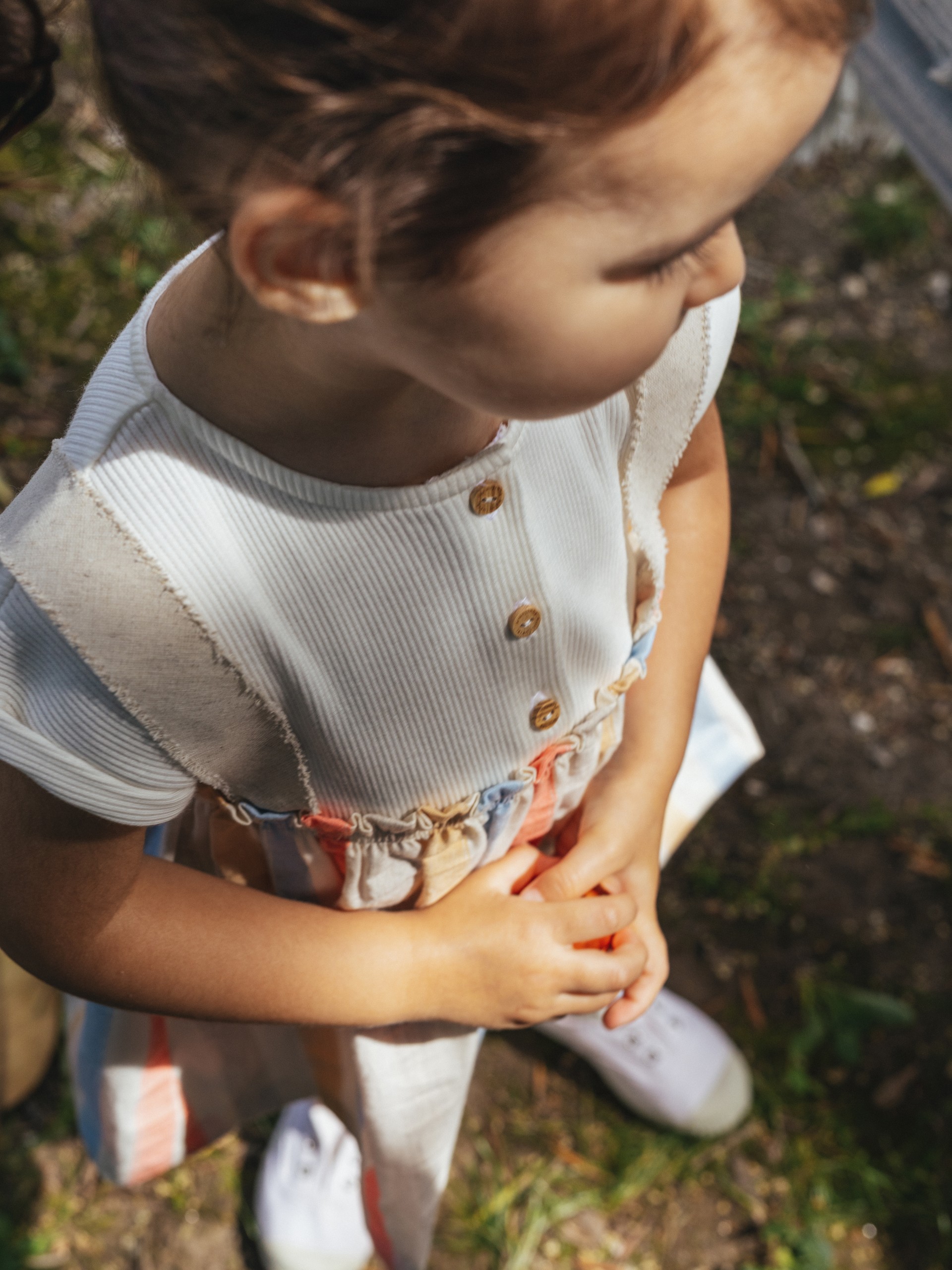 Robe en maille cannelée et tissu à rayures