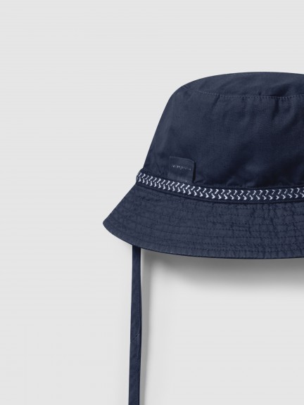 Reversible hat with decorative ribbon Reversible hat with decorative ribbon