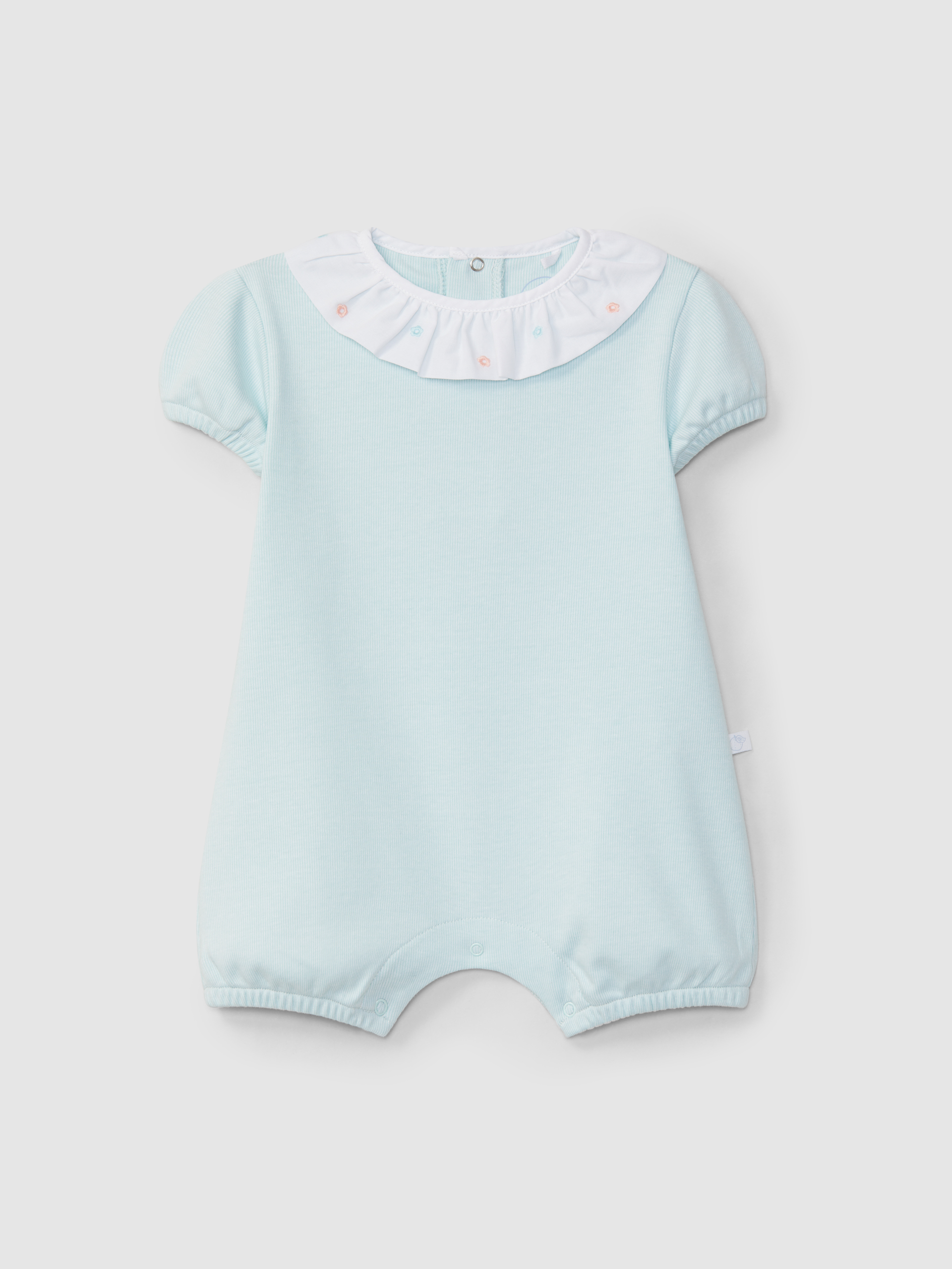 Trajecito cuello volante con flores bordadas
