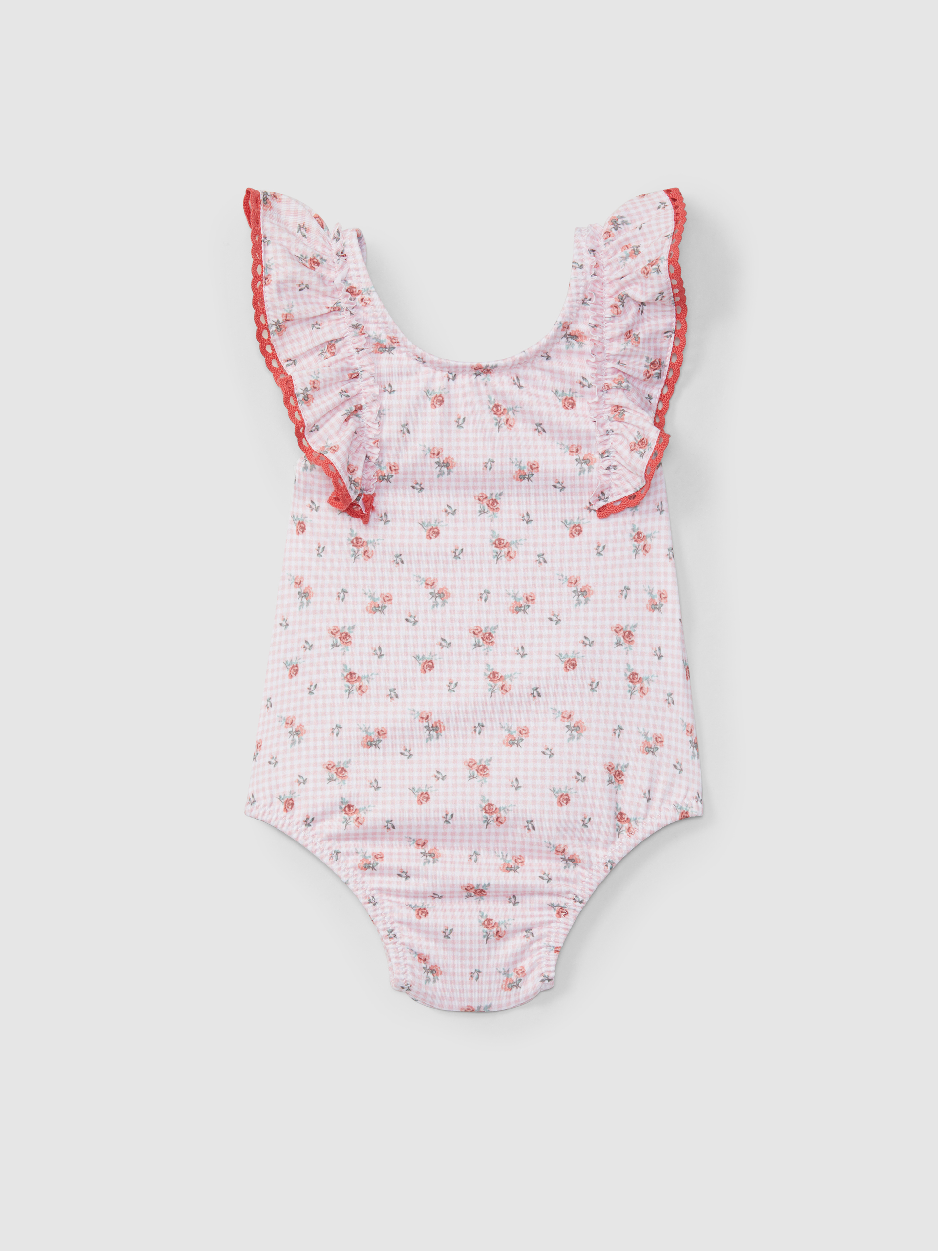 Shortie-style swimsuit flowers and crochet detail