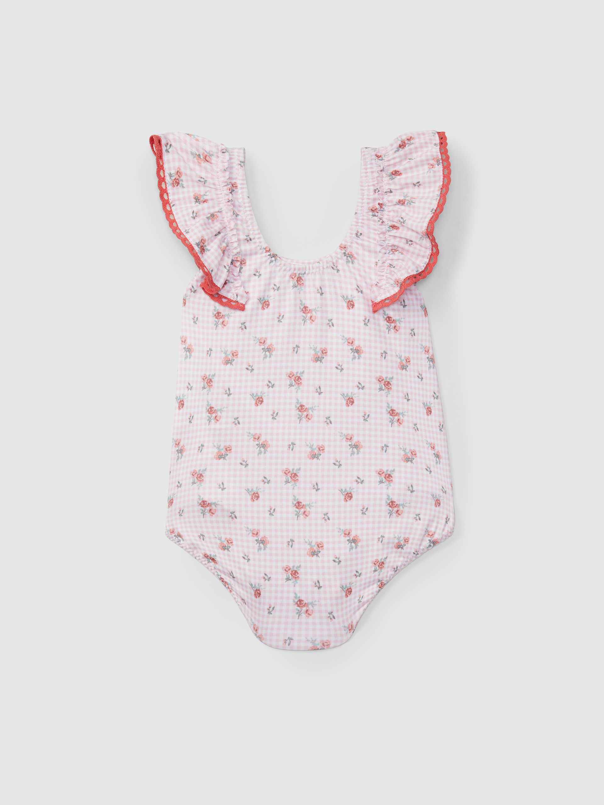 Shortie-style swimsuit flowers and crochet detail